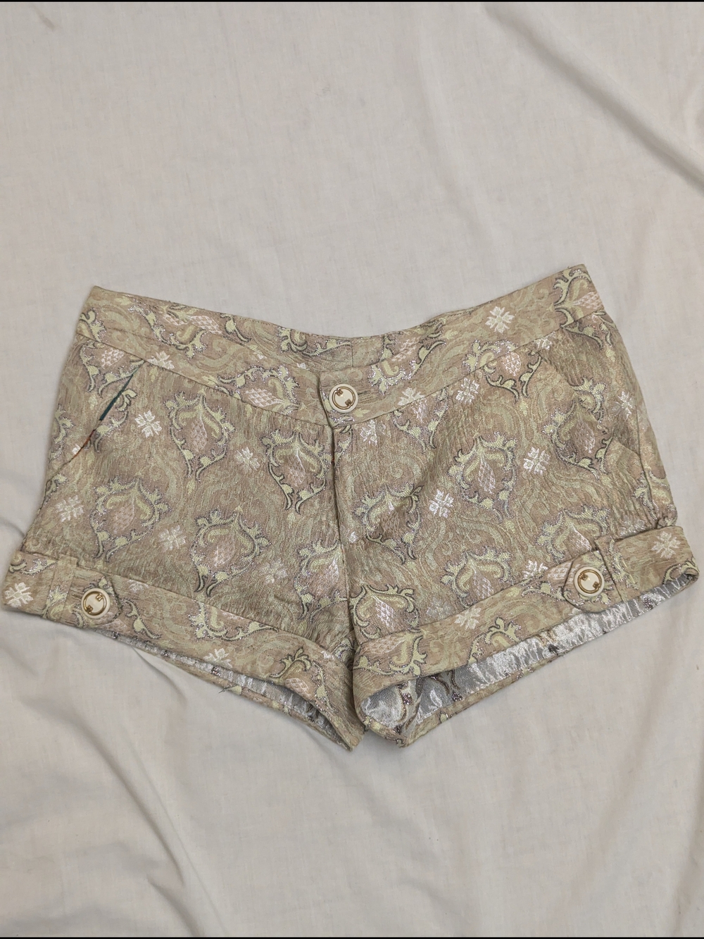 Gold-toned brocade jacquard shorts featuring an ornate paisley pattern Sz 0